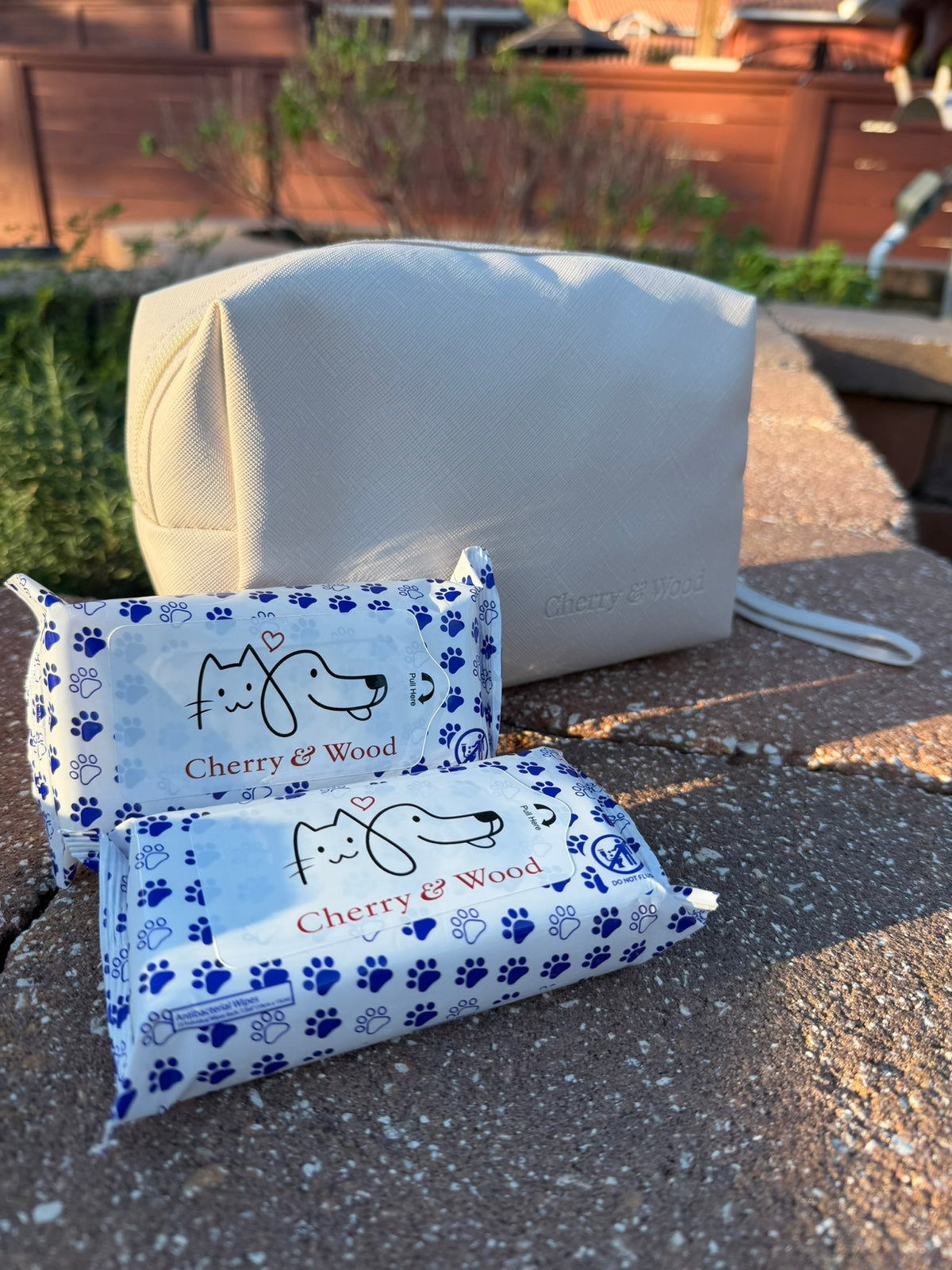 Pet wipes styled with a vanity bag