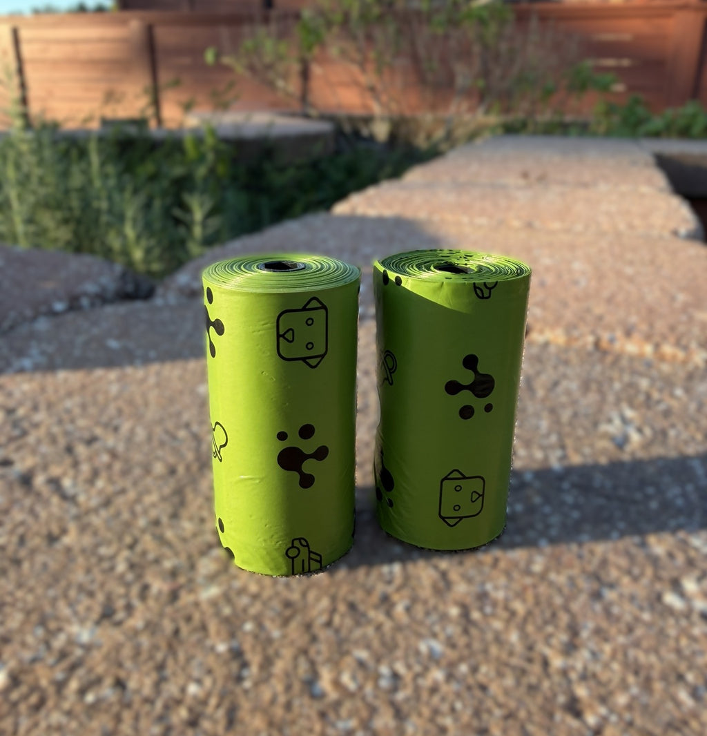 Two rolls of green dog poop bags