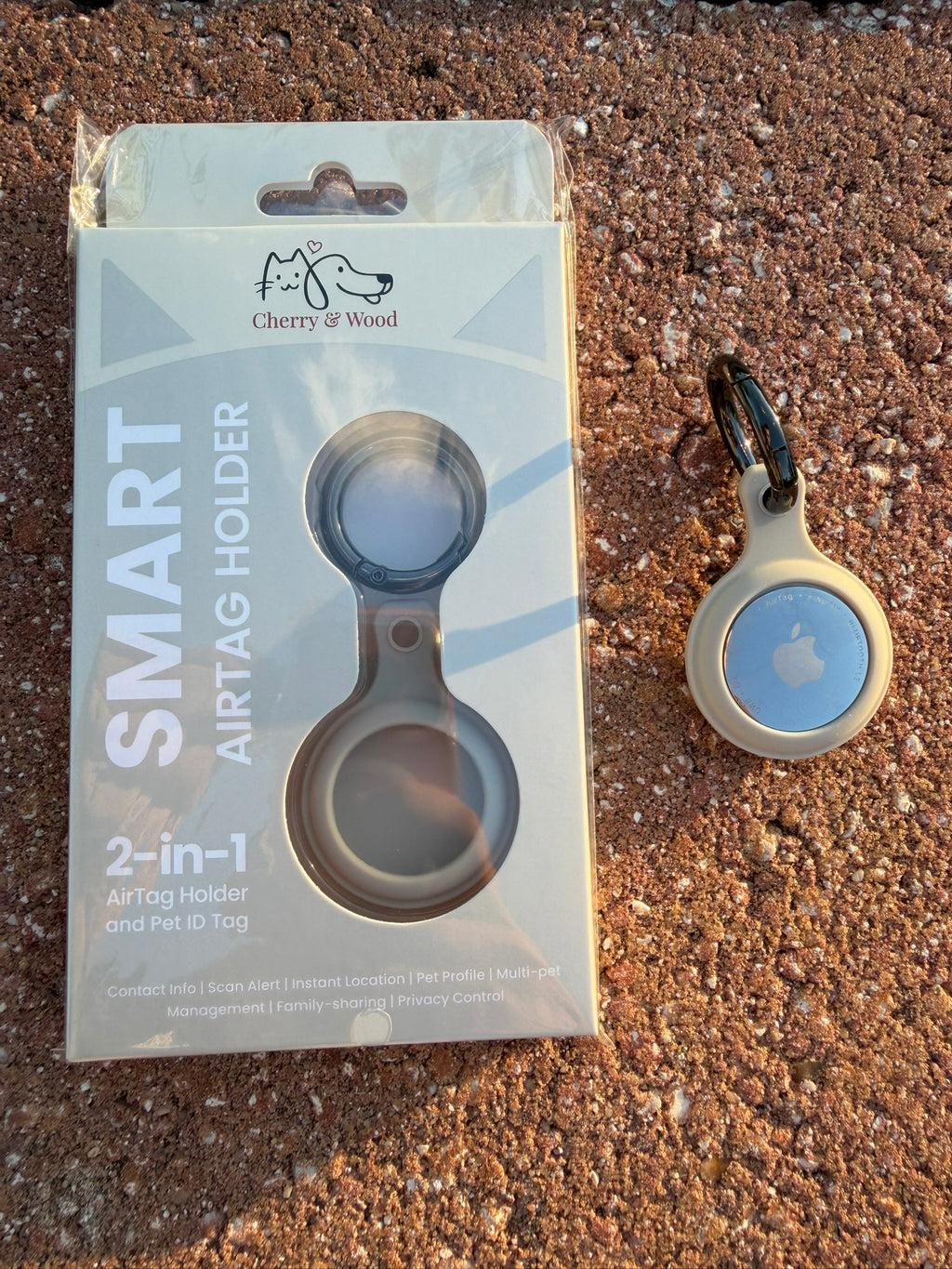 Beige AirTag holder for pet collars, shown with an AirTag